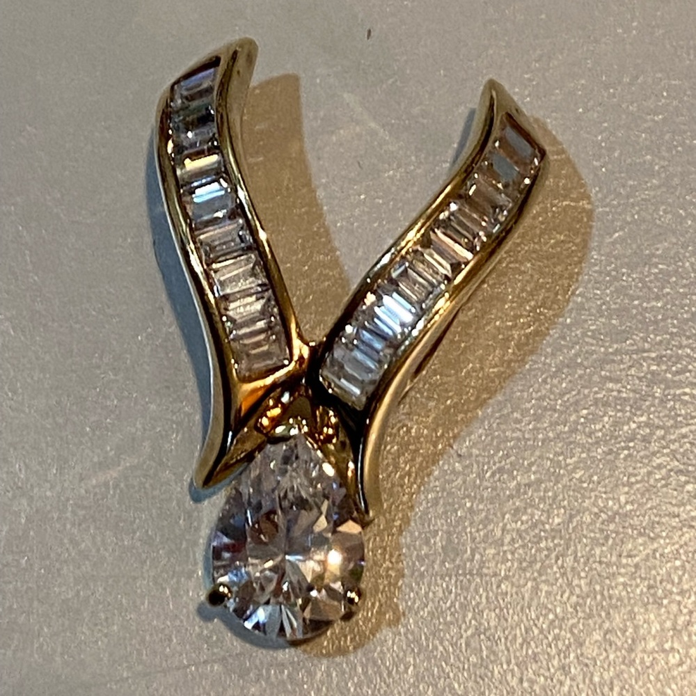 Baguette and pear solitaire pendant